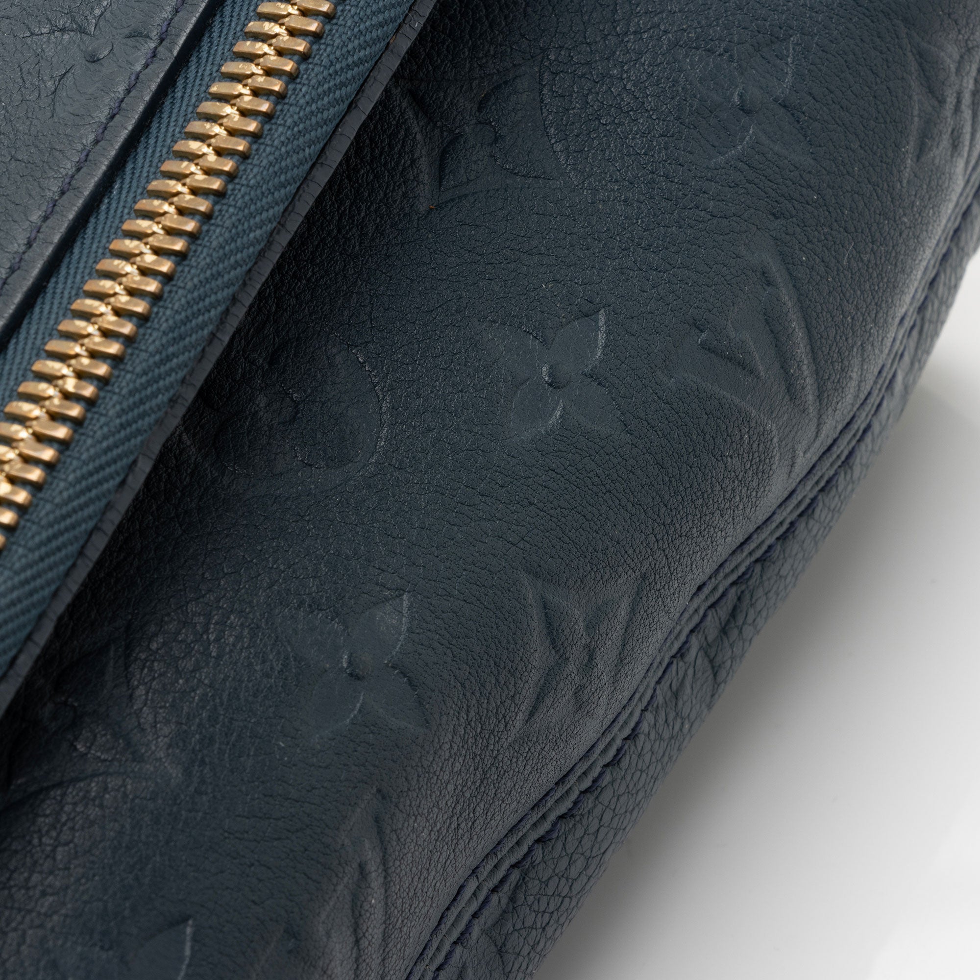 Louis Vuitton Monogram Empreinte Petillante Clutch (SHF-l9qwqD)