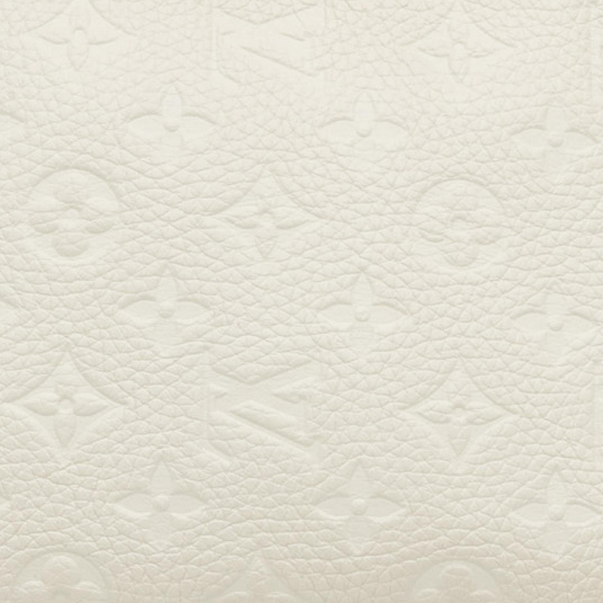 Louis Vuitton Monogram Empreinte Triangle (SHG-N0nuIO)
