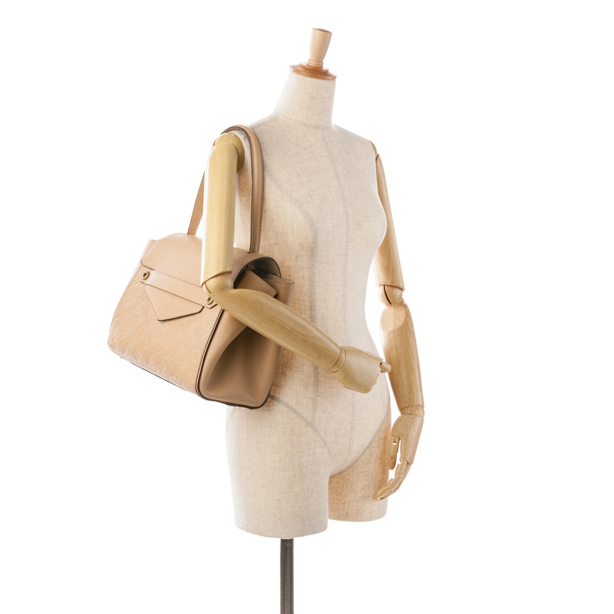Louis Vuitton Monogram Empreinte Trocadero (SHG-rJ3jer)