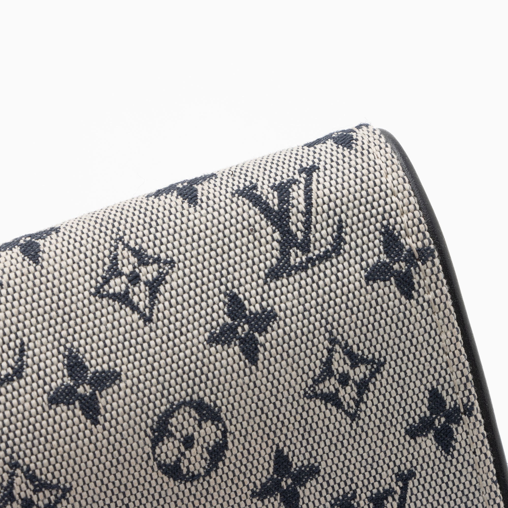 Louis Vuitton Monogram Mini Lin Porte Tresor International Wallet (SHF-NQBrFE)