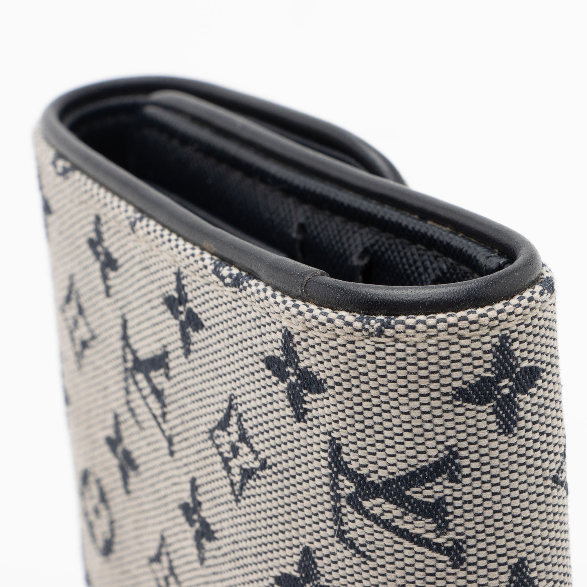 Louis Vuitton Monogram Mini Lin Porte Tresor International Wallet (SHF-NQBrFE)