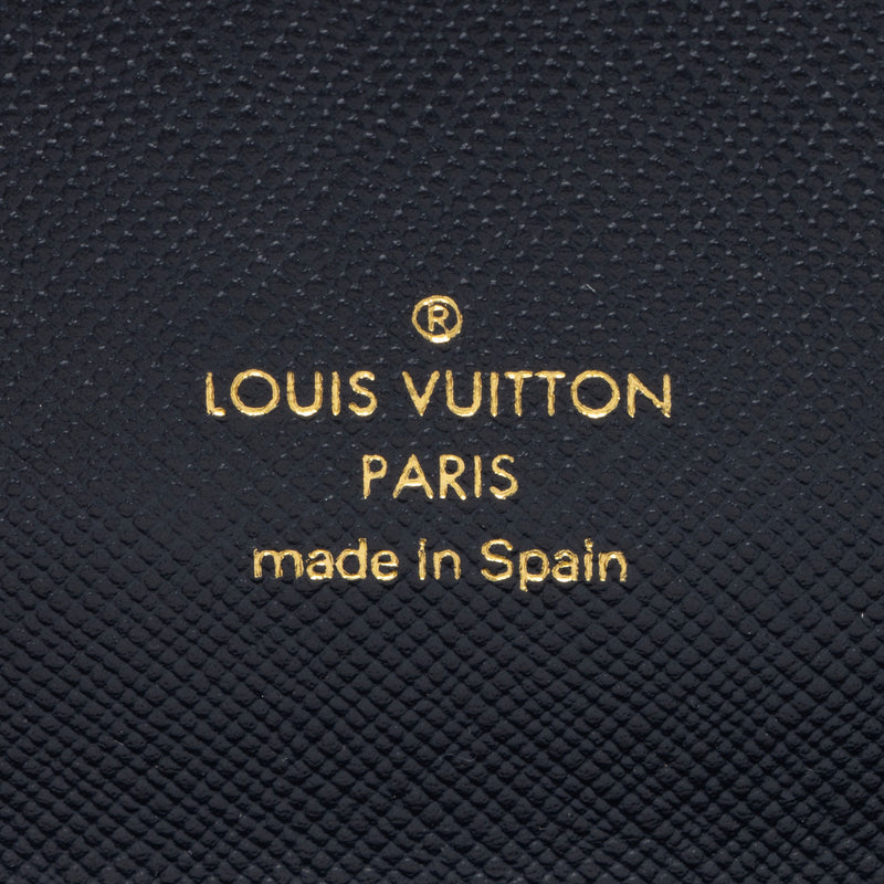 Louis Vuitton Monogram Mini Lin Porte Tresor International Wallet (SHG –  LuxeDH