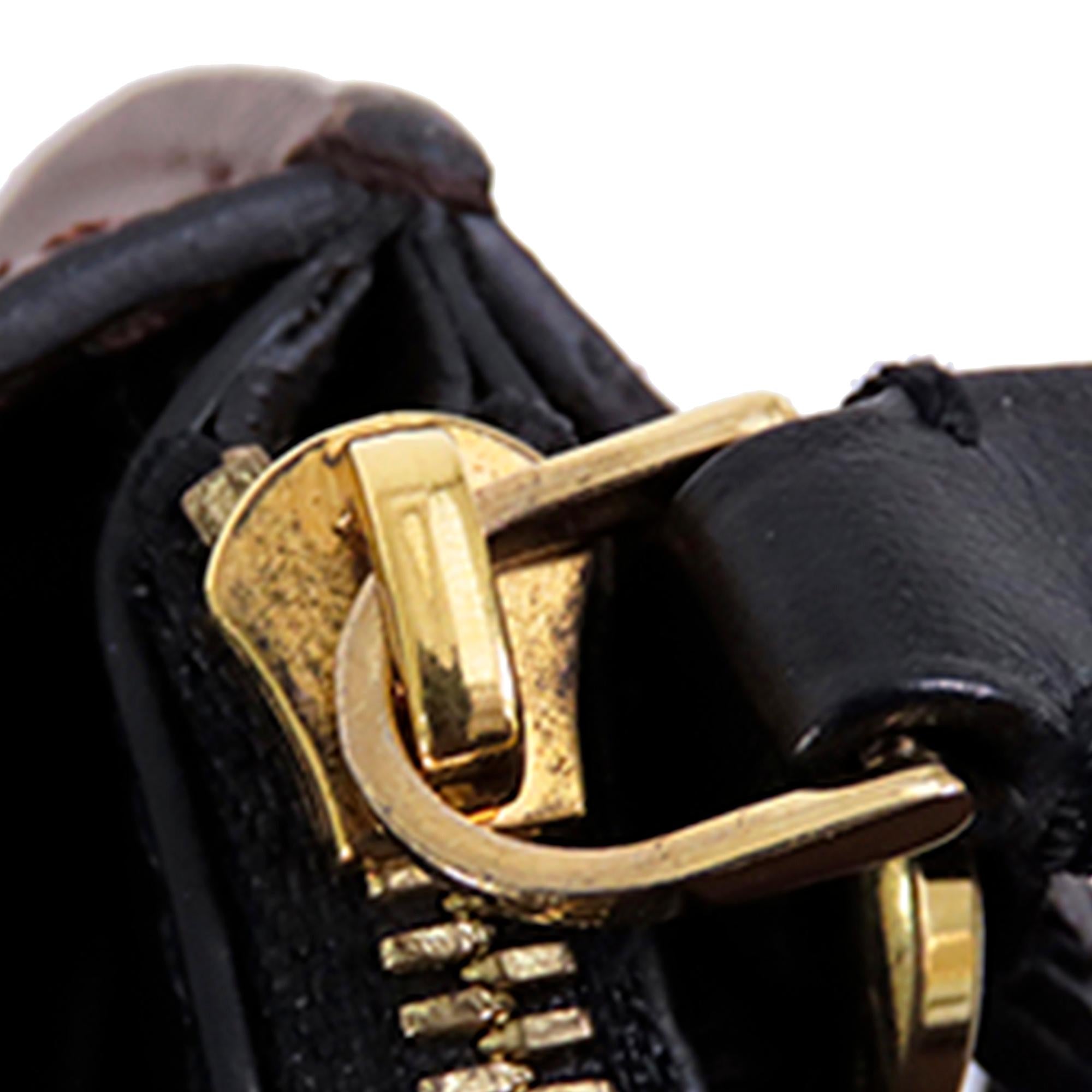 Louis Vuitton Monogram Noe Fringe (SHG-HyL7qM)