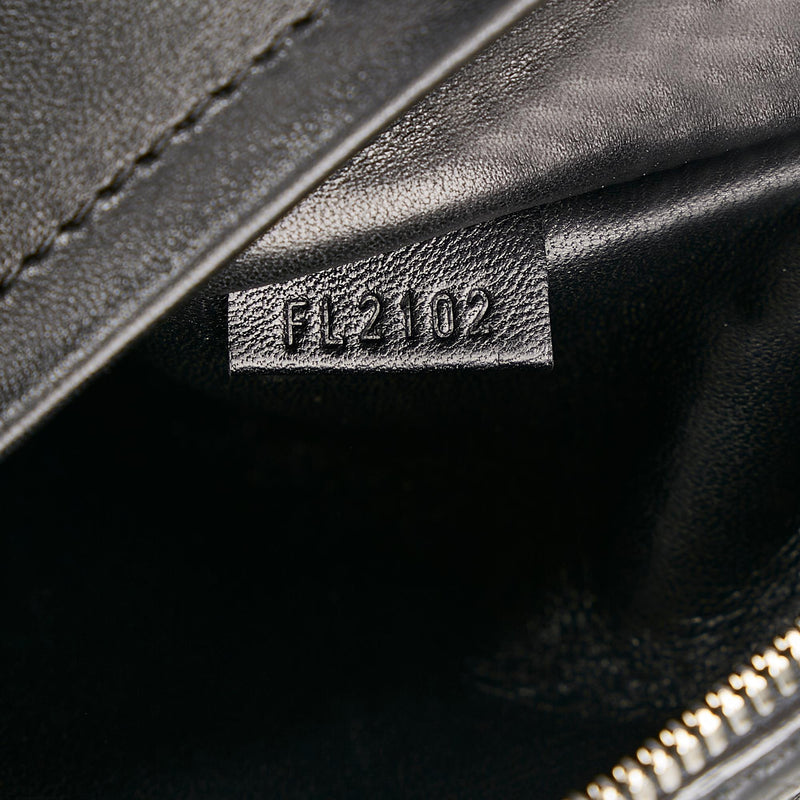 Louis Vuitton Black Monogram Revelation Neo Papillon GM Bag Louis Vuitton |  The Luxury Closet