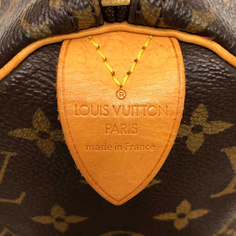 Louis Vuitton Monogram Speedy 25 (SHG-krmWpH)