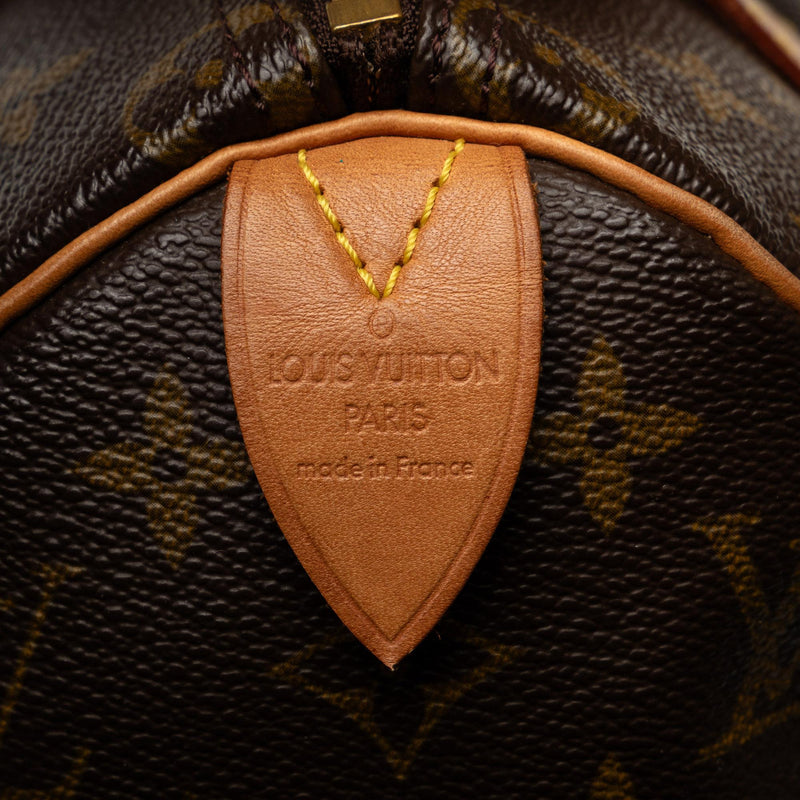 Louis Vuitton Monogram Speedy 25 (SHG-DavcuU)