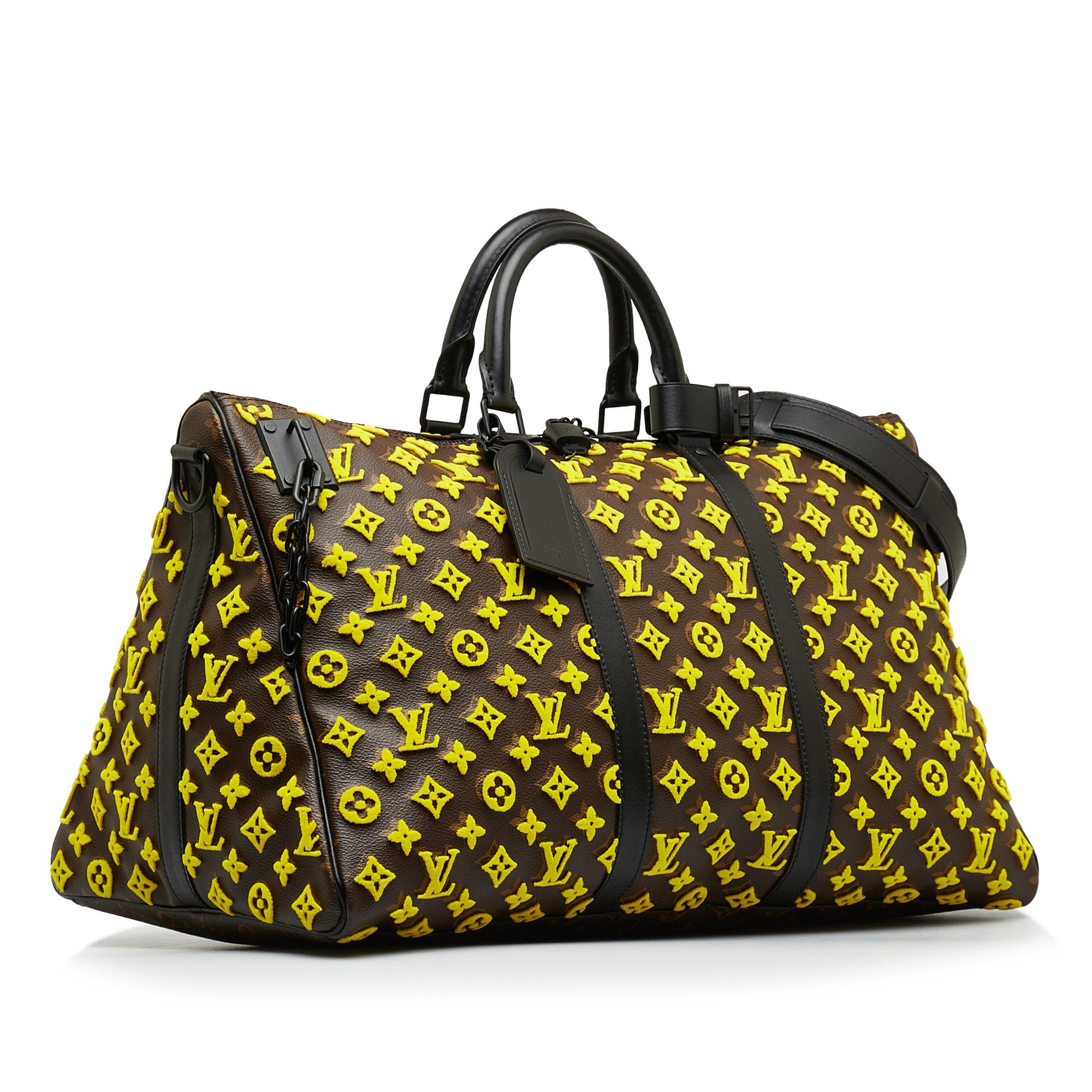 Louis Vuitton Monogram Tuffetage Triangle Keepall Bandouliere 50 (SHG-ohQ7xi)
