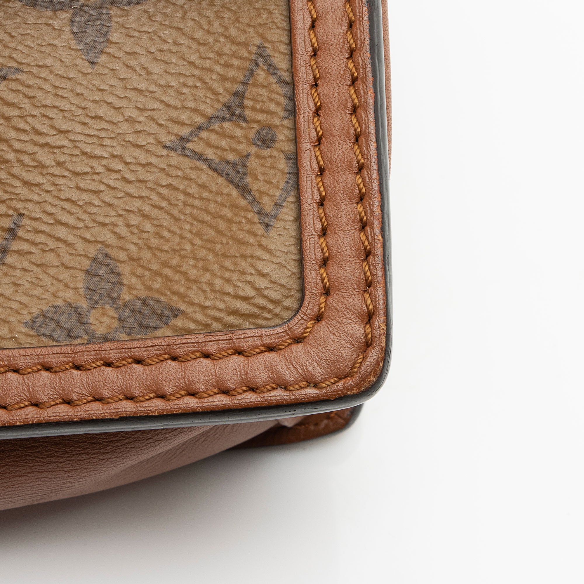 Louis Vuitton Reverse Monogram Dauphine Chain Wallet