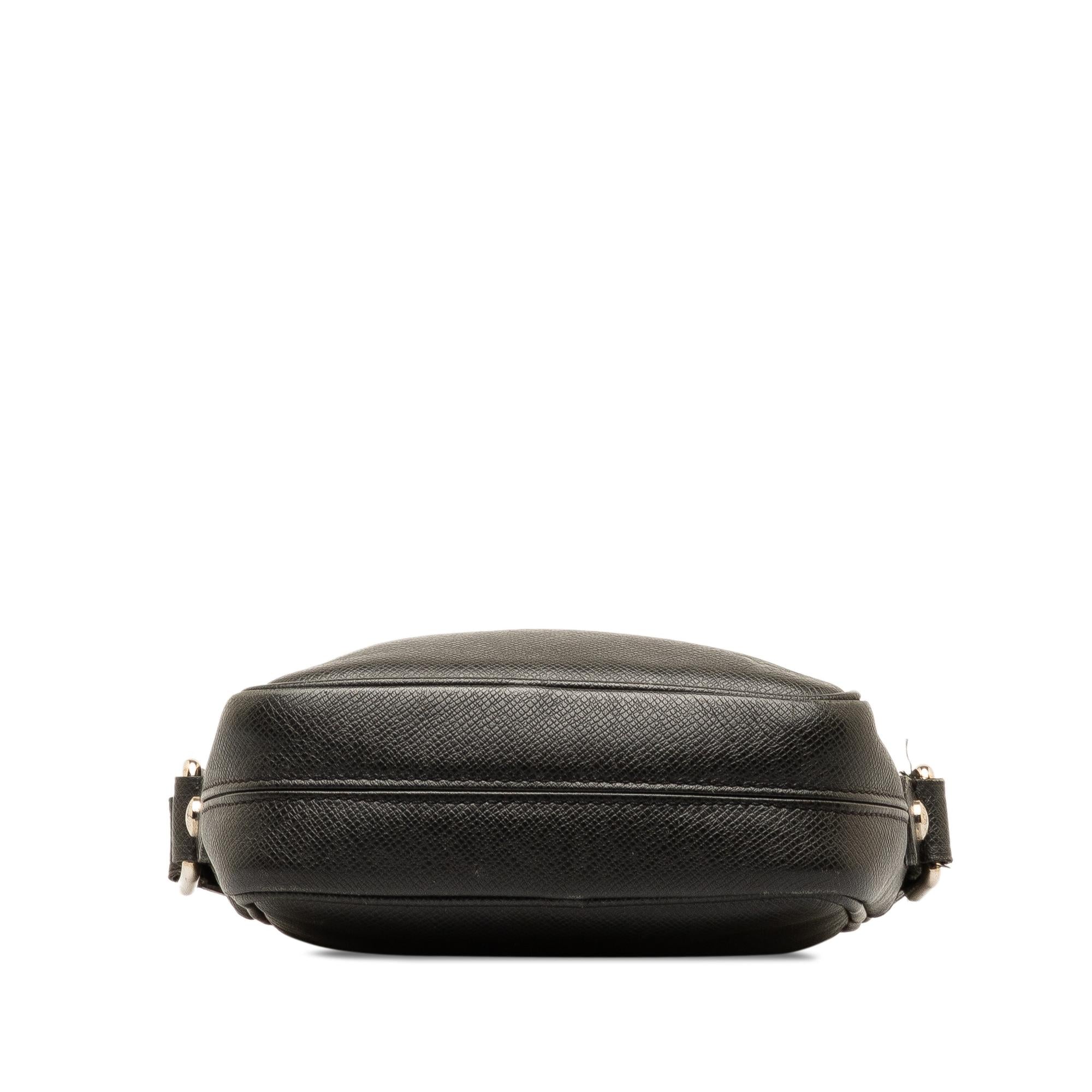 Louis Vuitton Taiga Dimitri (SHG-IIYDM1)