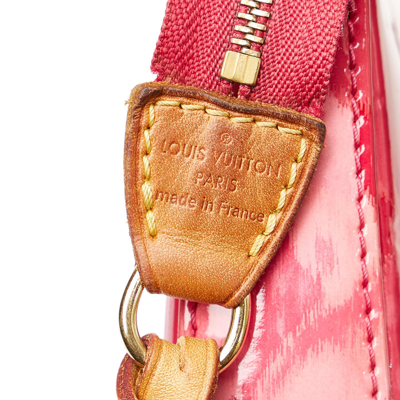 Louis Vuitton on X: Find the adorable Pochette Accessoires Monogram Vernis  Ikat in the #SheSoLV selection at    / X