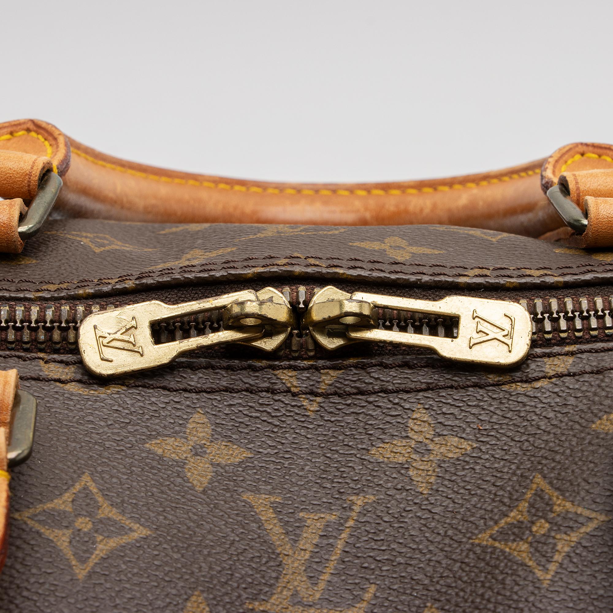 Louis Vuitton Vintage Monogram Canvas Keepall 55 Duffle Bag (SHF-HJ33aV)