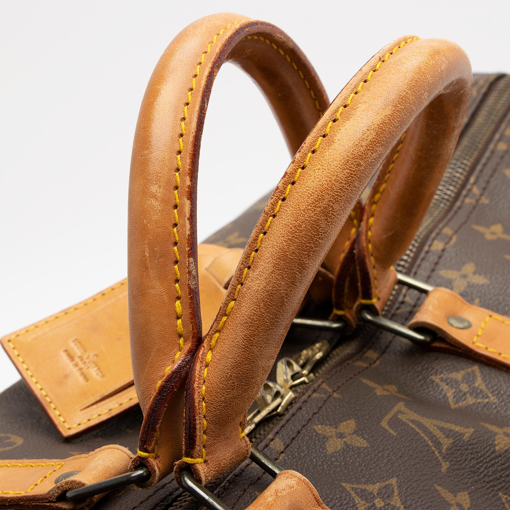 Louis Vuitton Vintage Monogram Canvas Keepall 55 Duffle Bag (SHF-HJ33aV)