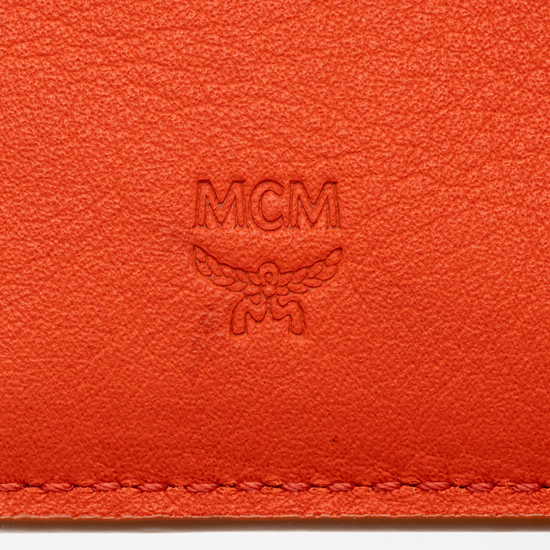 MCM Embossed Leather Large Zip Wallet (SHF-22468) – LuxeDH