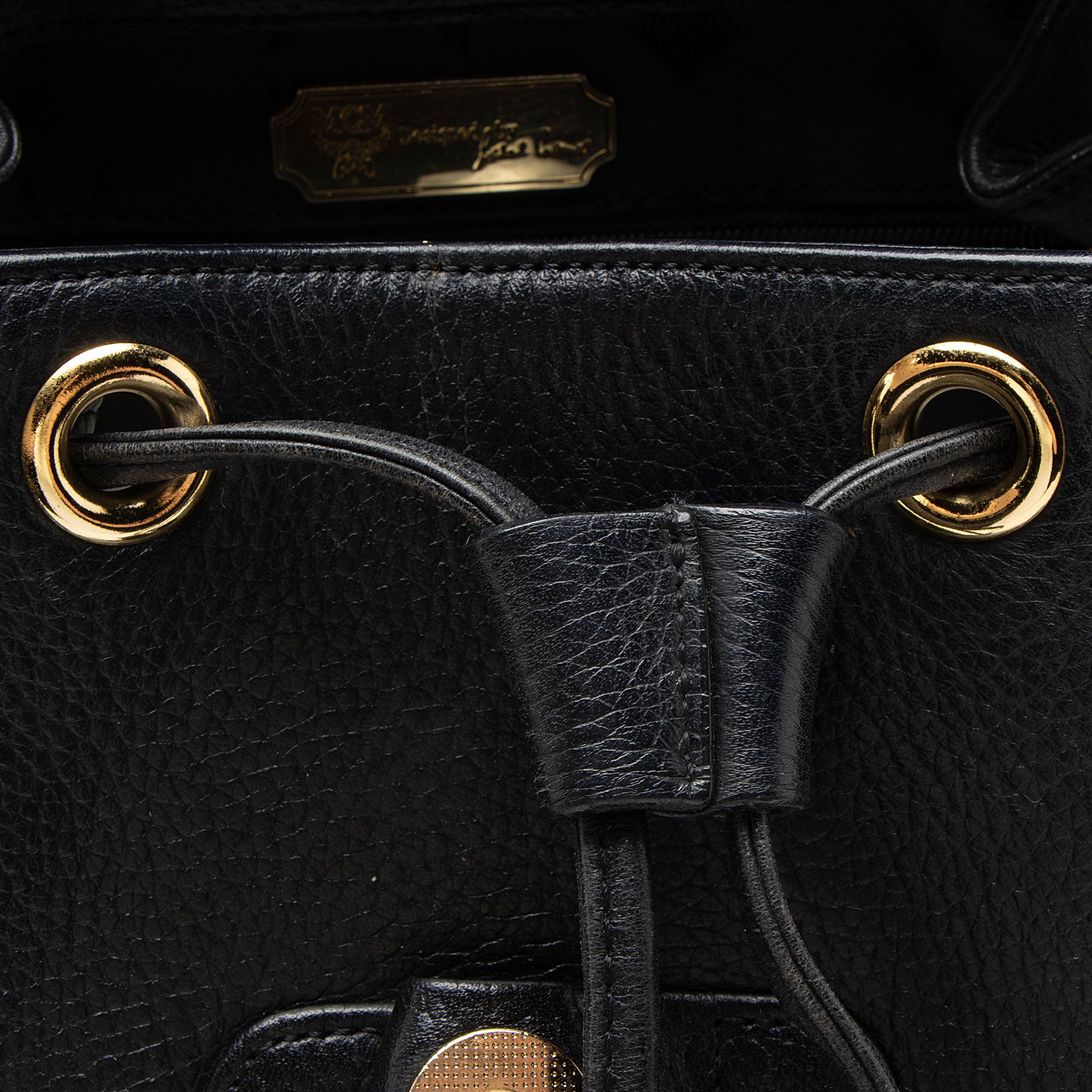 MCM Vintage Leather Logo Charms Drawstring Backpack