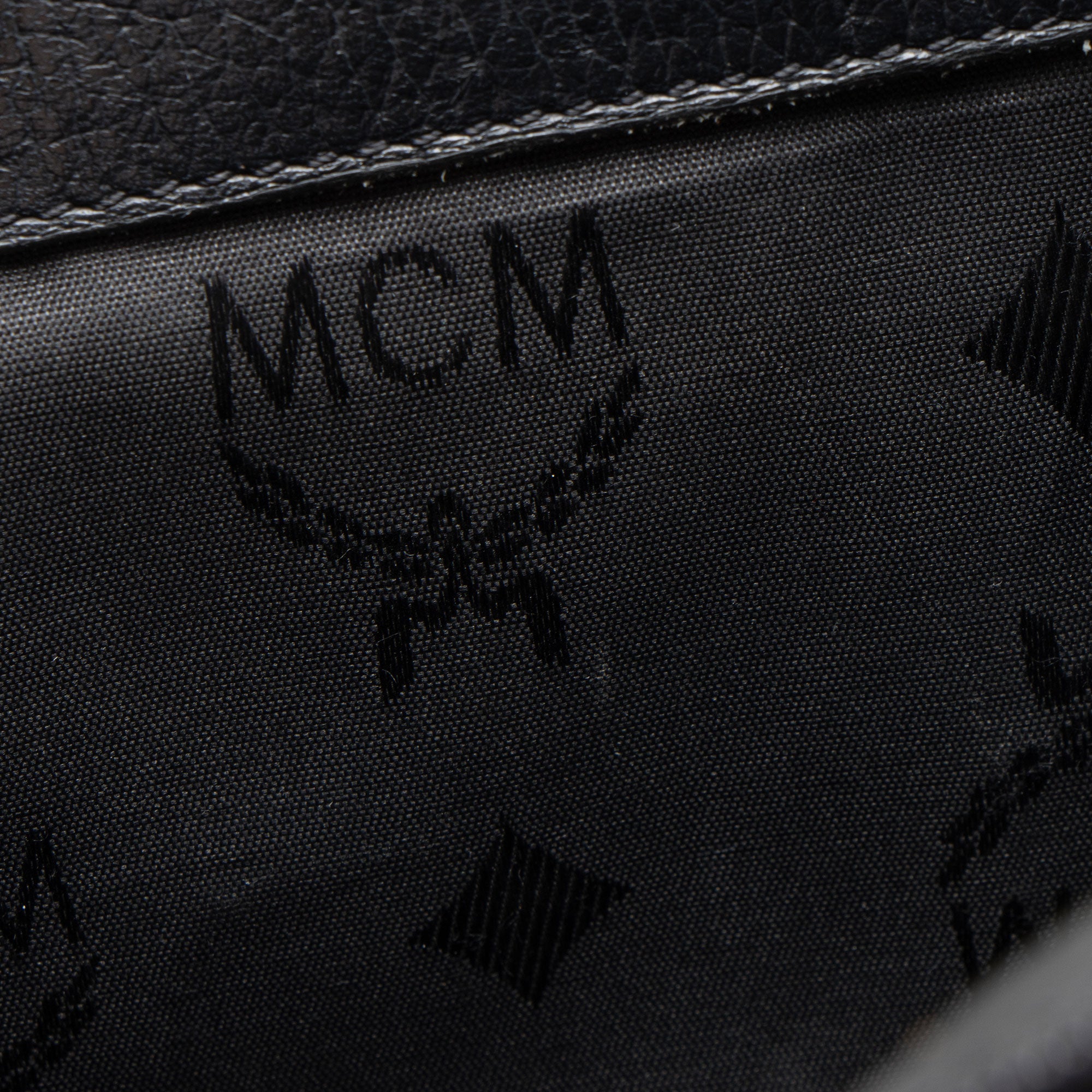 MCM Vintage Leather Logo Charms Drawstring Backpack