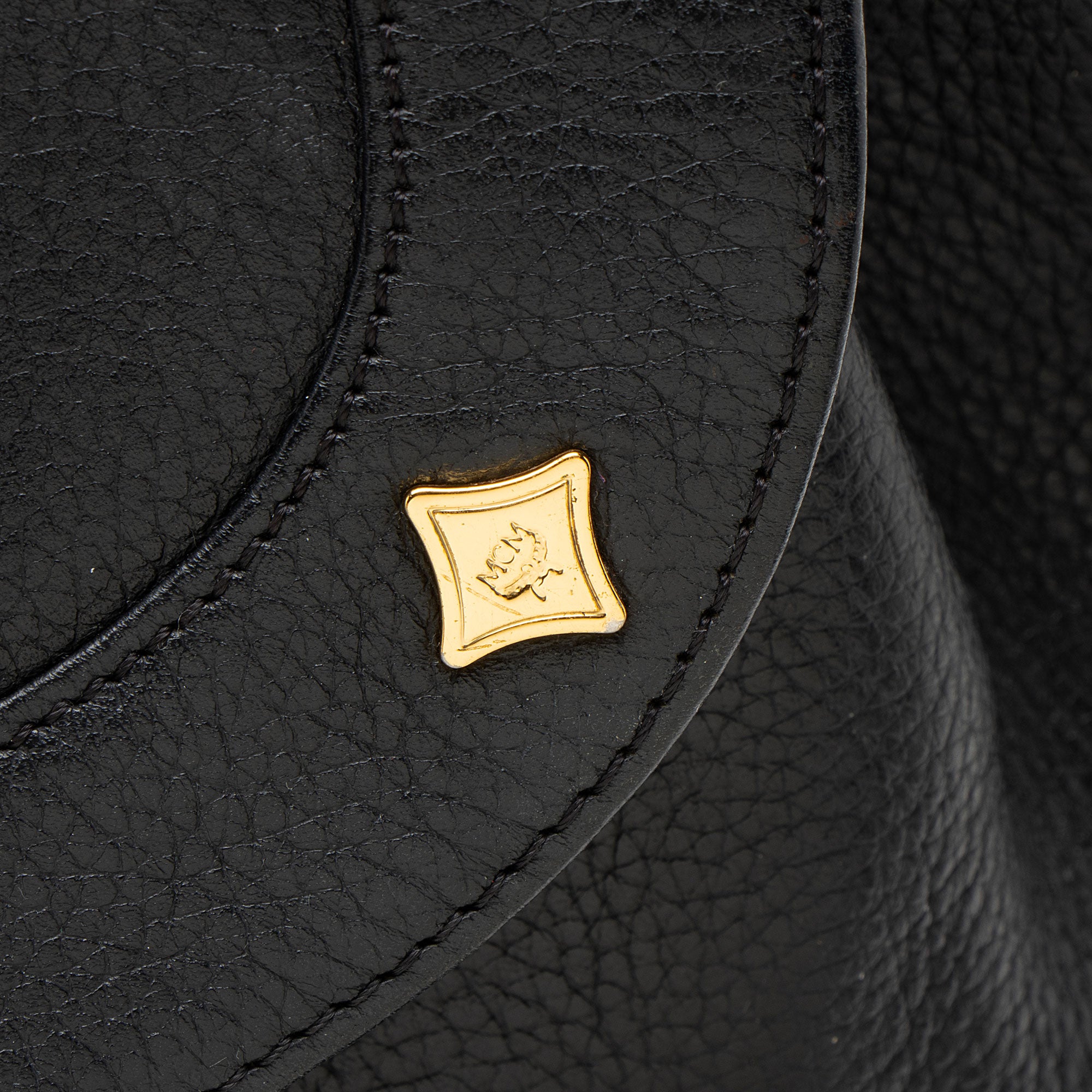 MCM Vintage Leather Logo Charms Drawstring Backpack