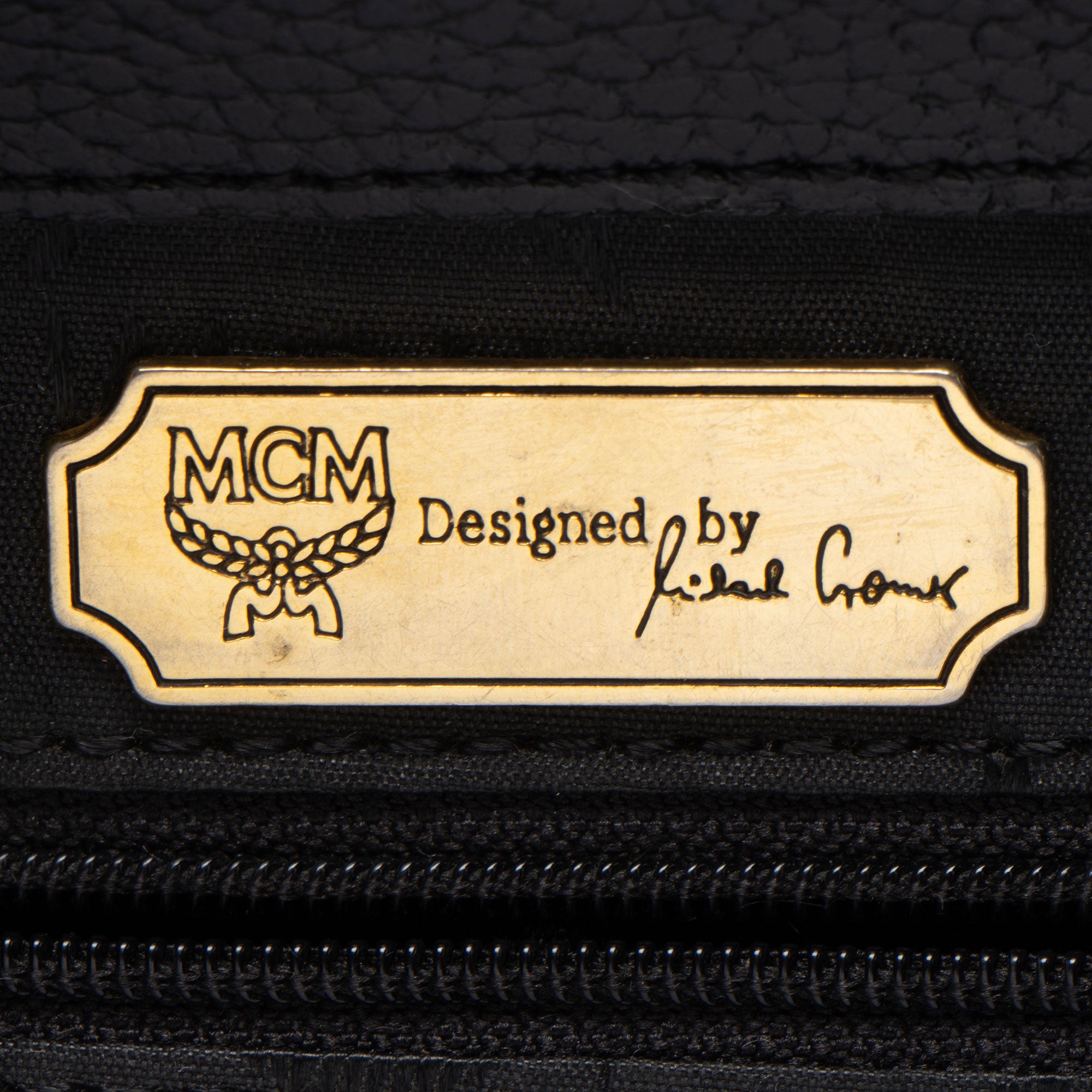 MCM Vintage Leather Logo Charms Drawstring Backpack