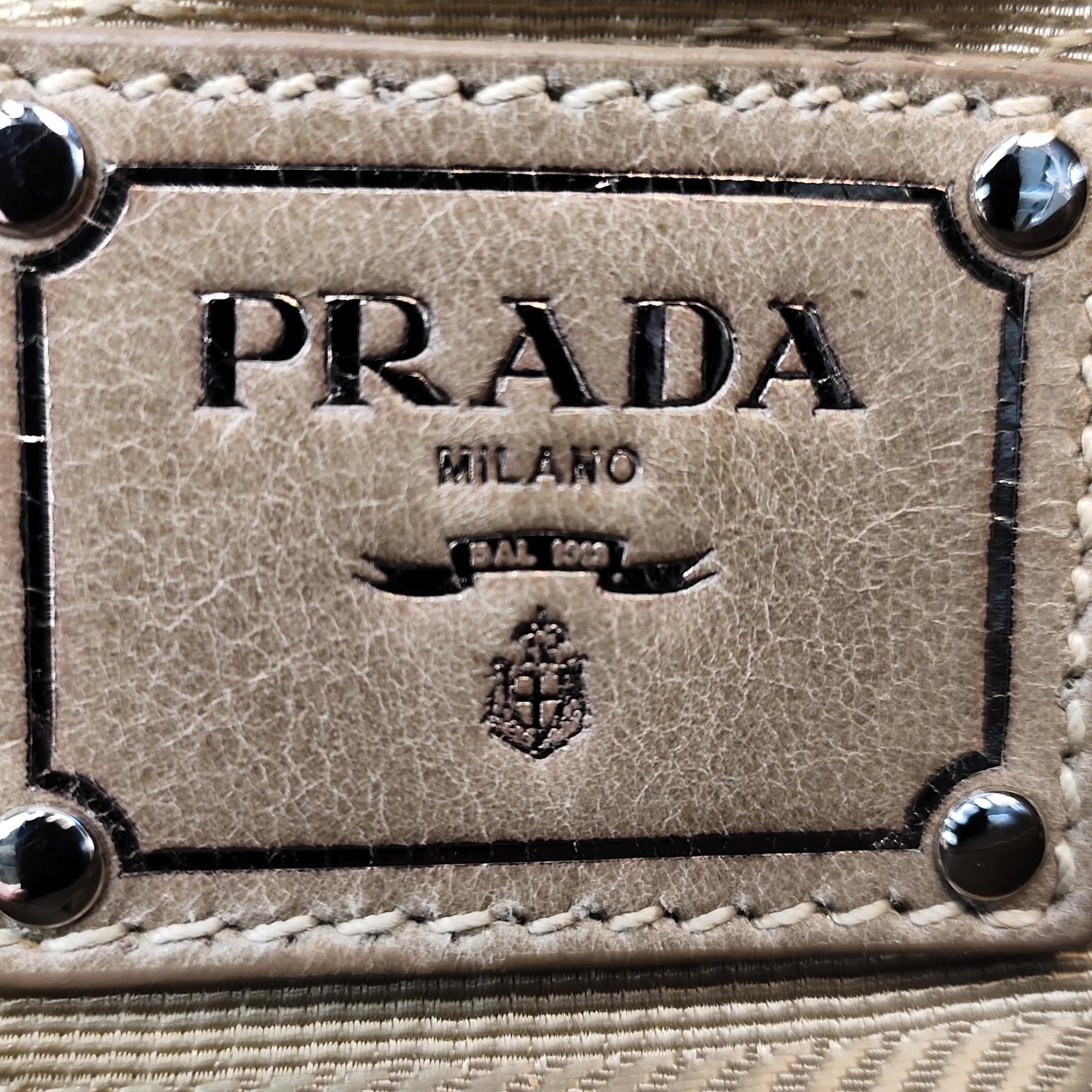 Prada Vitello Shine Turn Lock Baguette (SHG-kNYA2Z)
