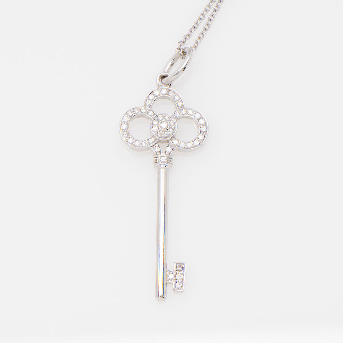 Tiffany & Co. 18k White Gold Diamond Key Crown Necklace