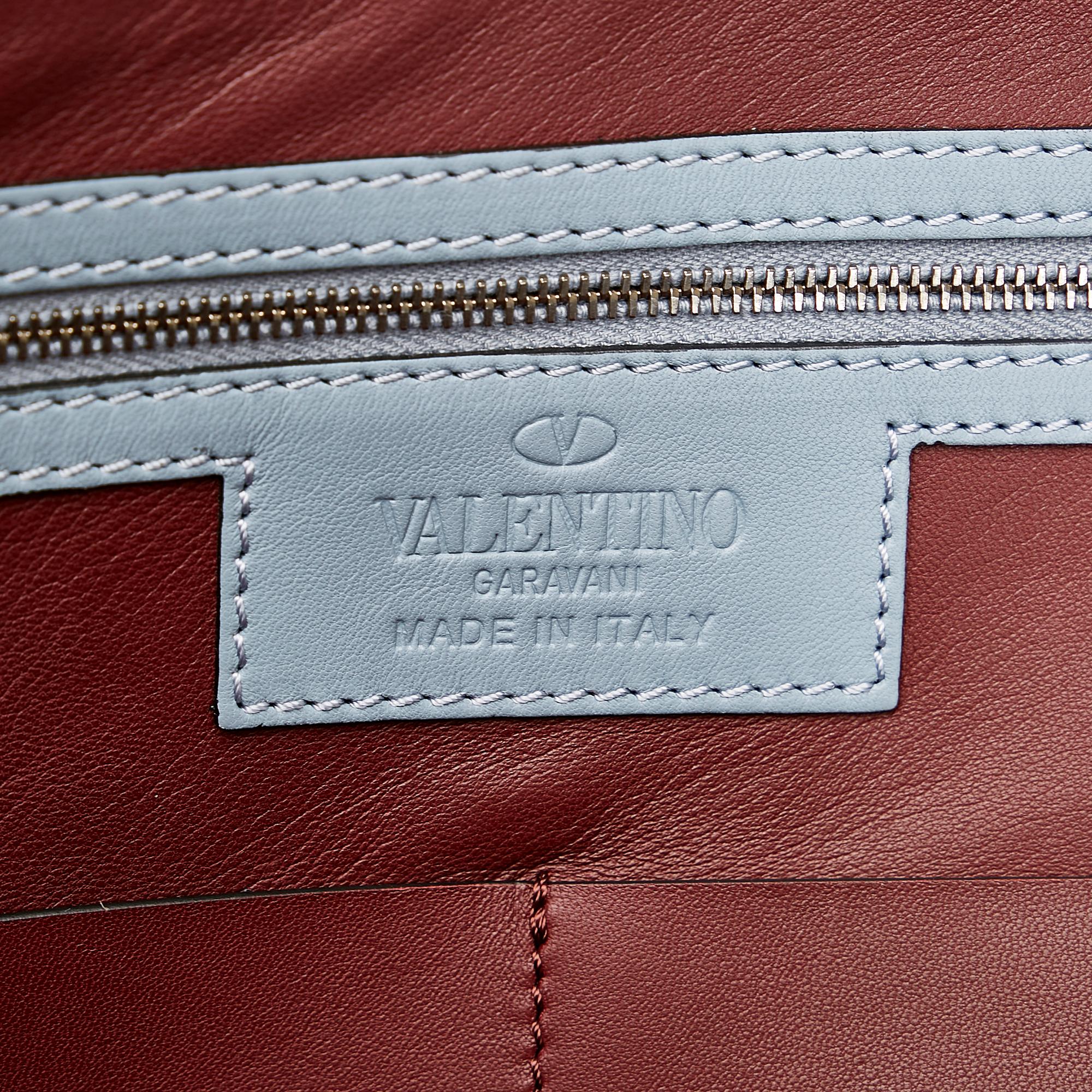 Valentino Camouflage Canvas and Leather Clutch Bag (SHG-RYK6ji)