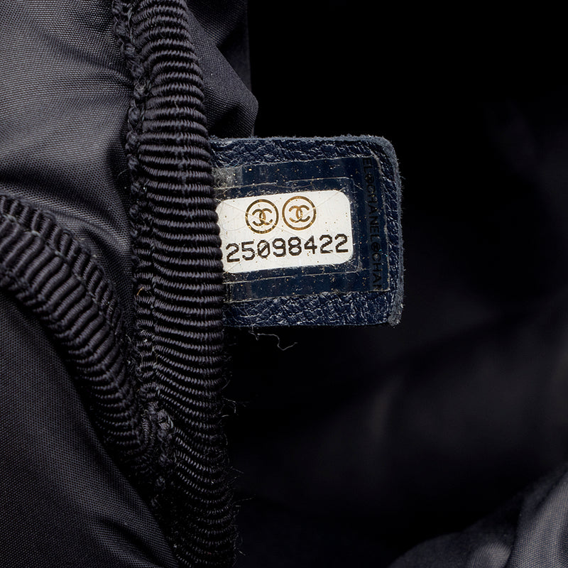 Chanel Embossed Nylon Logo Doudoune Large Backpack (SHF-17689