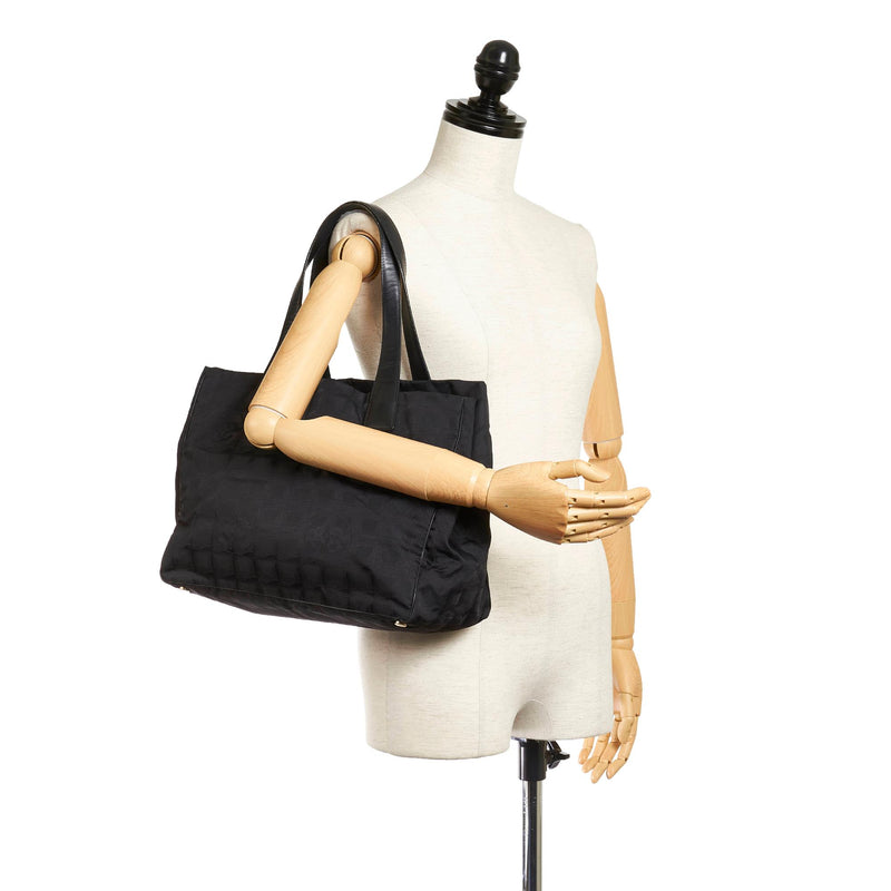 Chanel New Travel Line Nylon Tote Bag (SHG-28187) – LuxeDH