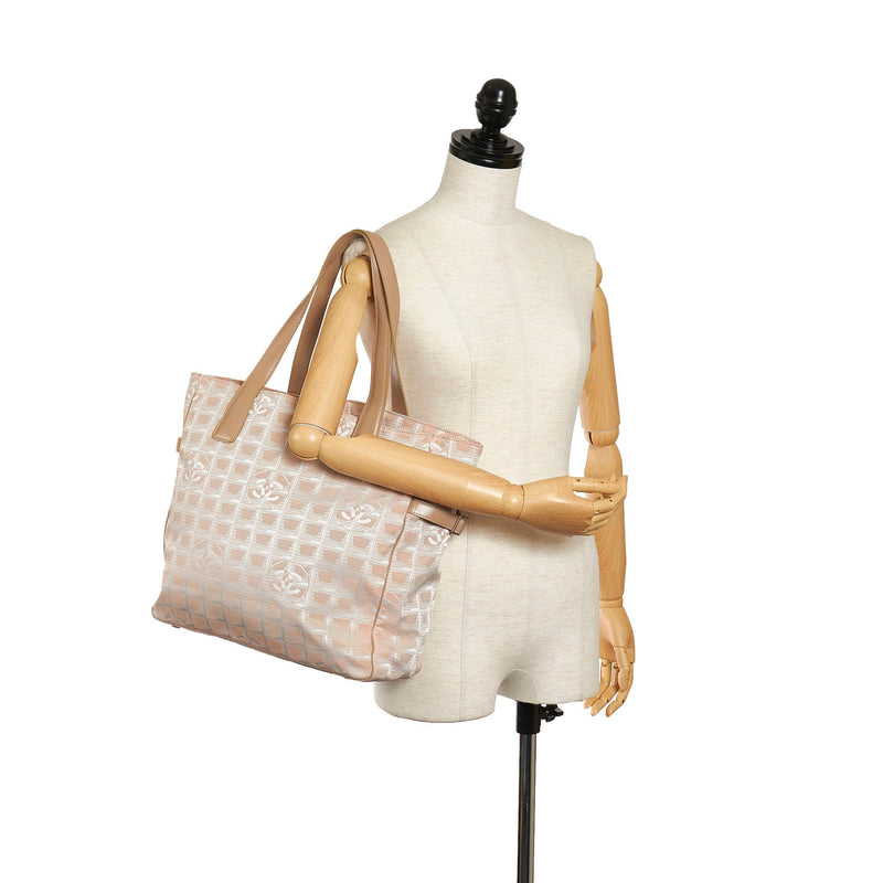 Chanel New Travel Line Nylon Tote Bag (SHG-29684) – LuxeDH