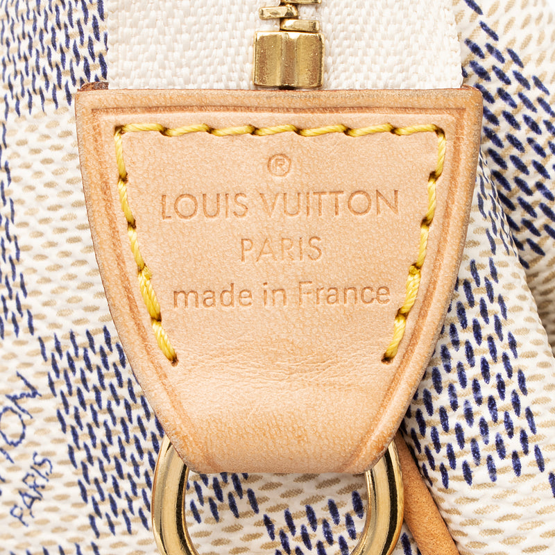 Louis Vuitton Damier Azur Eva. Very popular small zippered