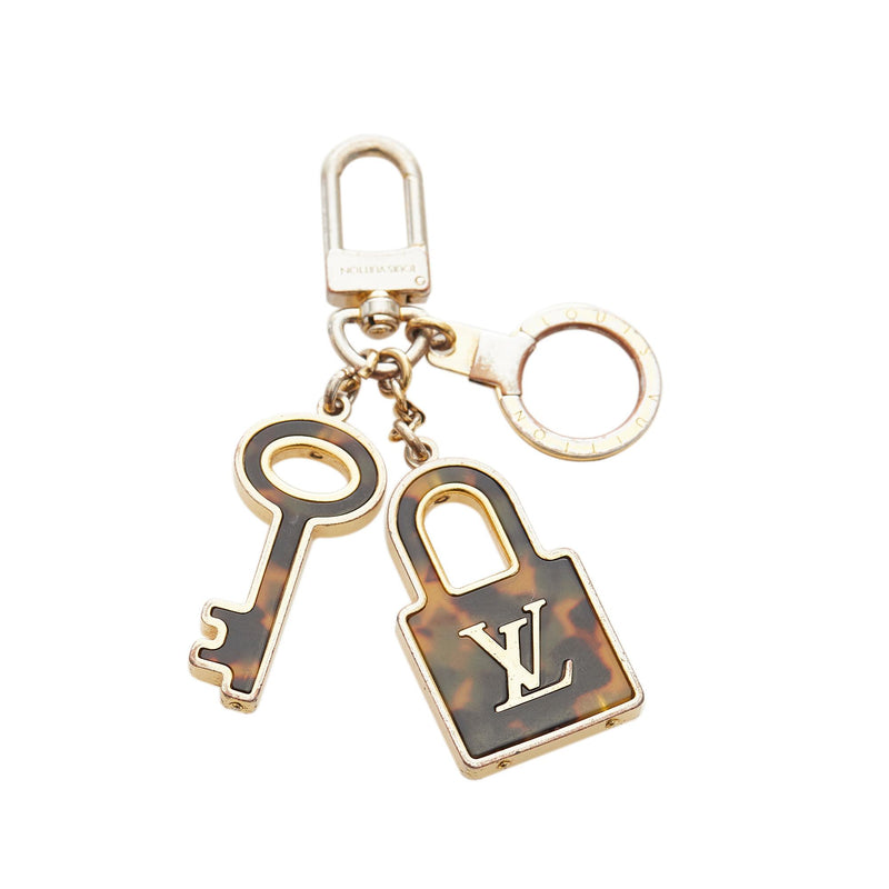 louis vuitton handbag with lock and key