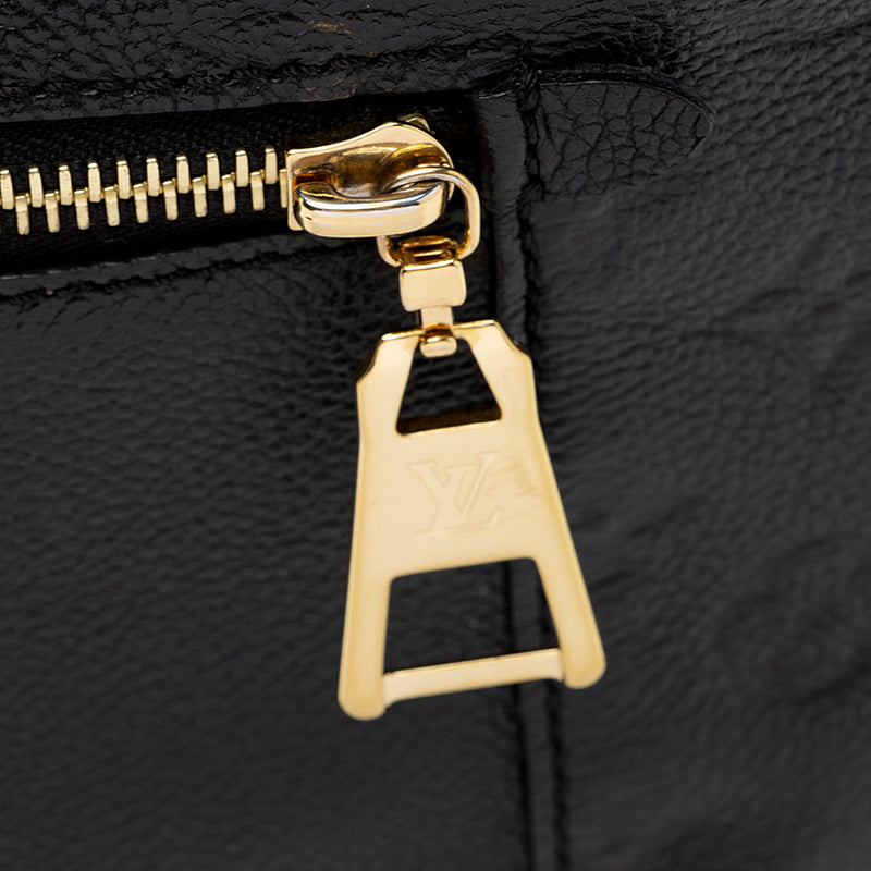 Louis Vuitton Giant Monogram Empreinte Madeleine MM Top Handle Bag (SH –  LuxeDH