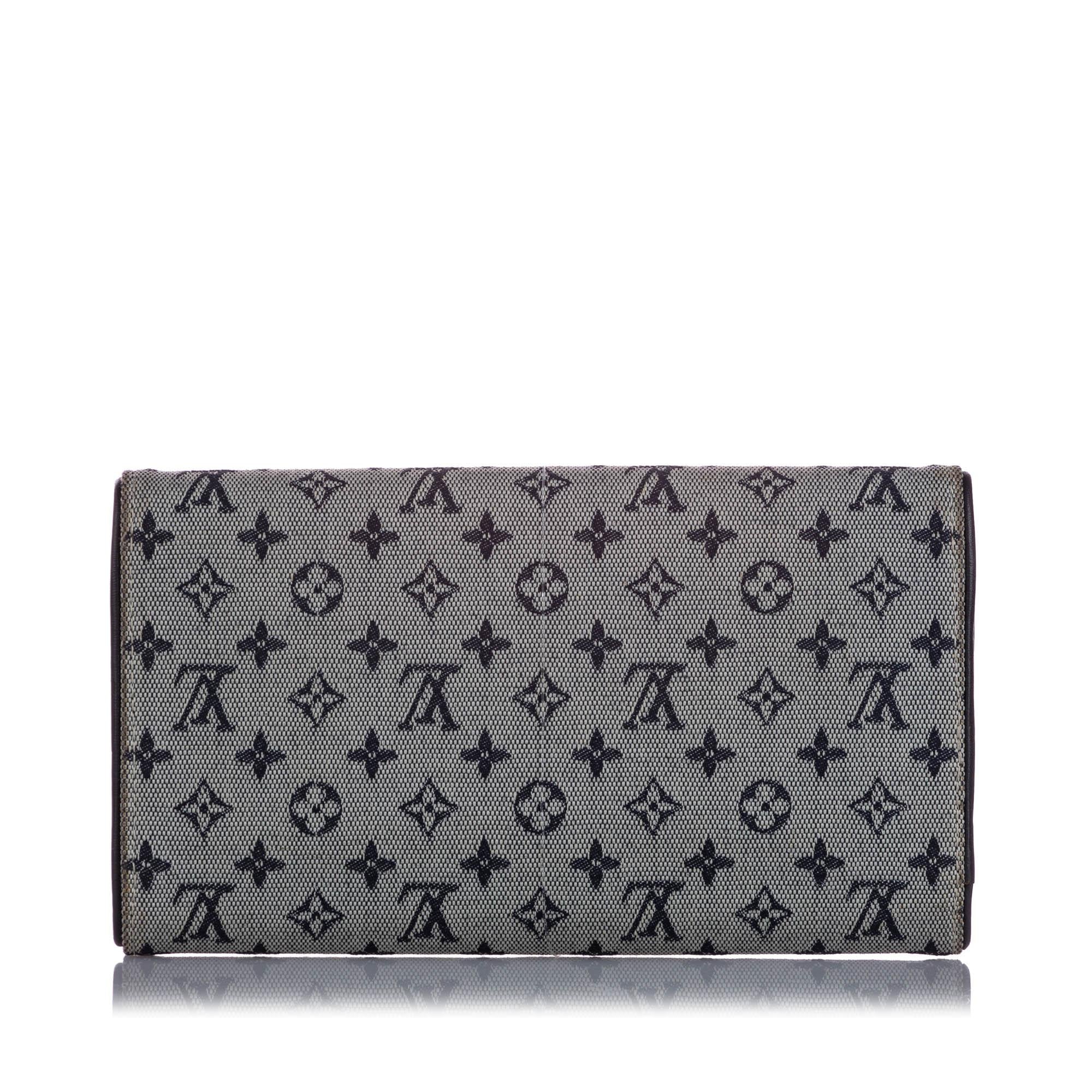 Louis Vuitton Monogram Mini Lin Porte Tresor International Wallet (SHG-37823)