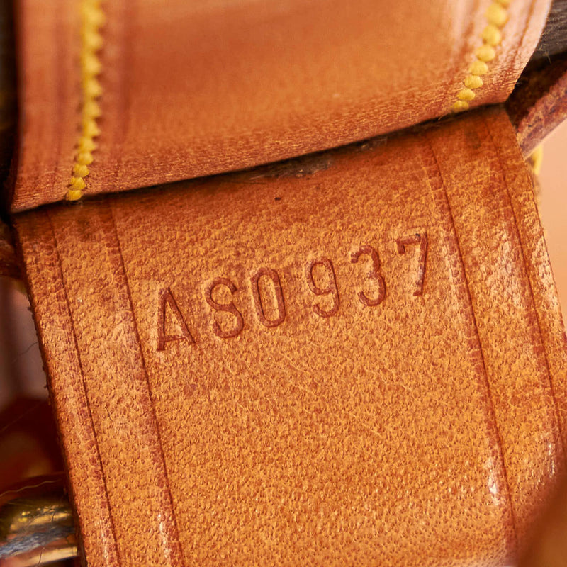 LOT:328  LOUIS VUITTON - a Monogram Randonnee GM backpack.