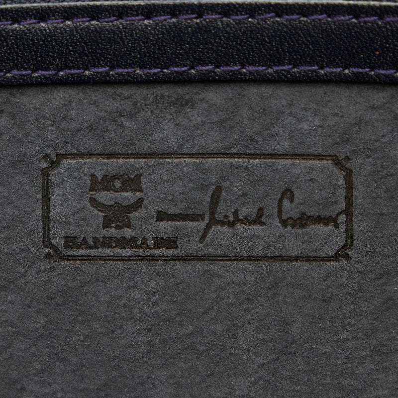 MCM Visetos Leather Clutch Bag (SHG-27806) – LuxeDH