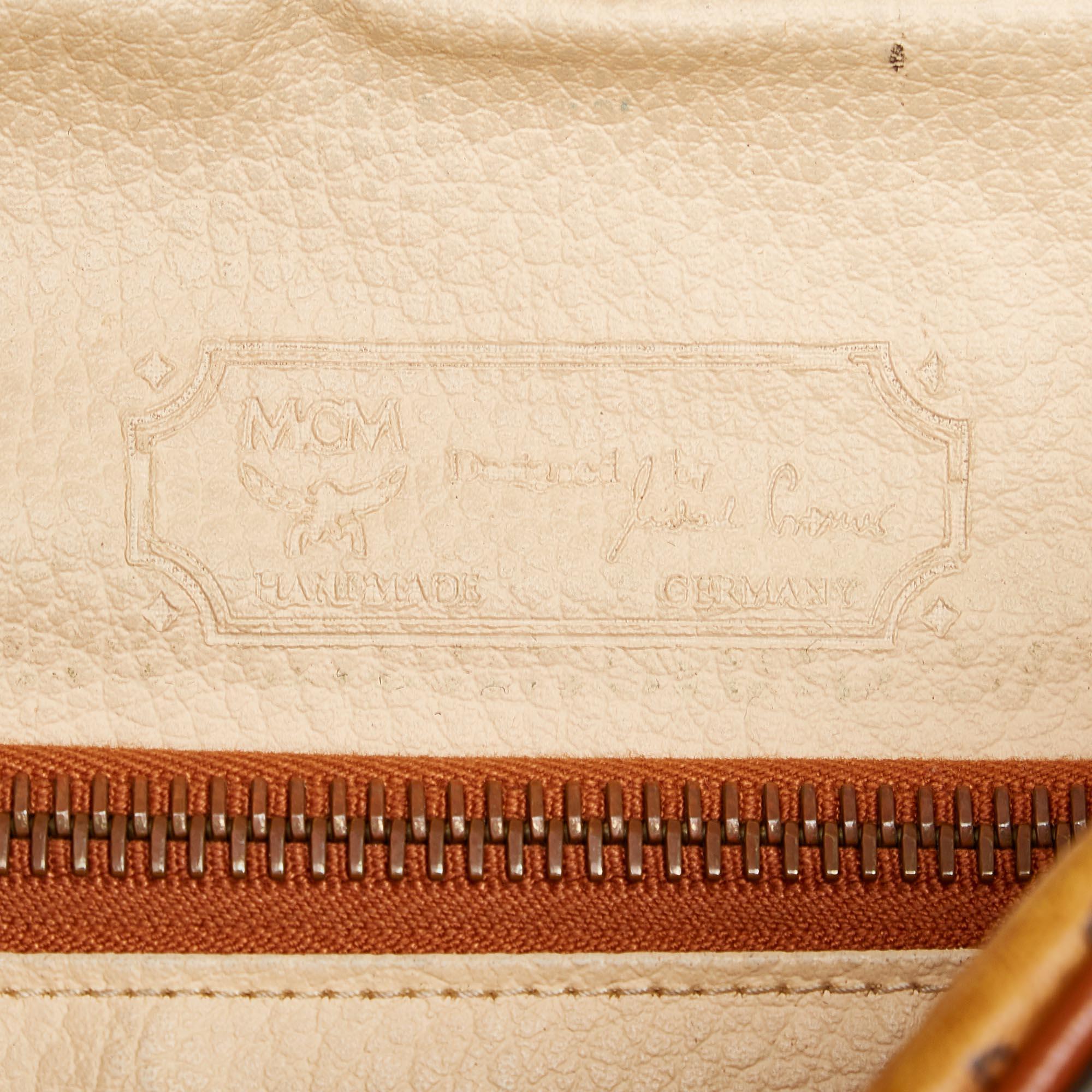 MCM Visetos Leather Clutch Bag (SHG-32575)