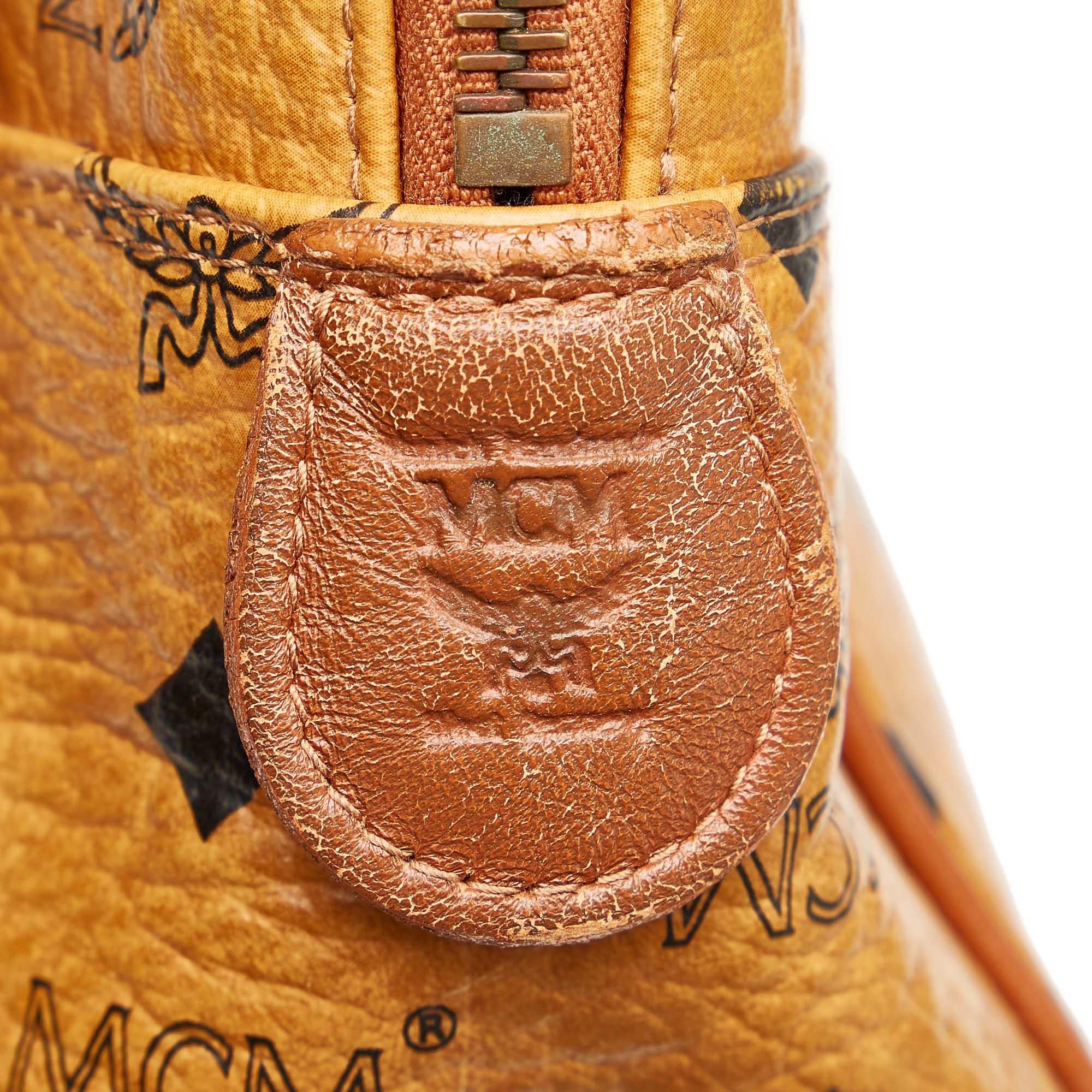 MCM Visetos Leather Clutch Bag (SHG-32575)