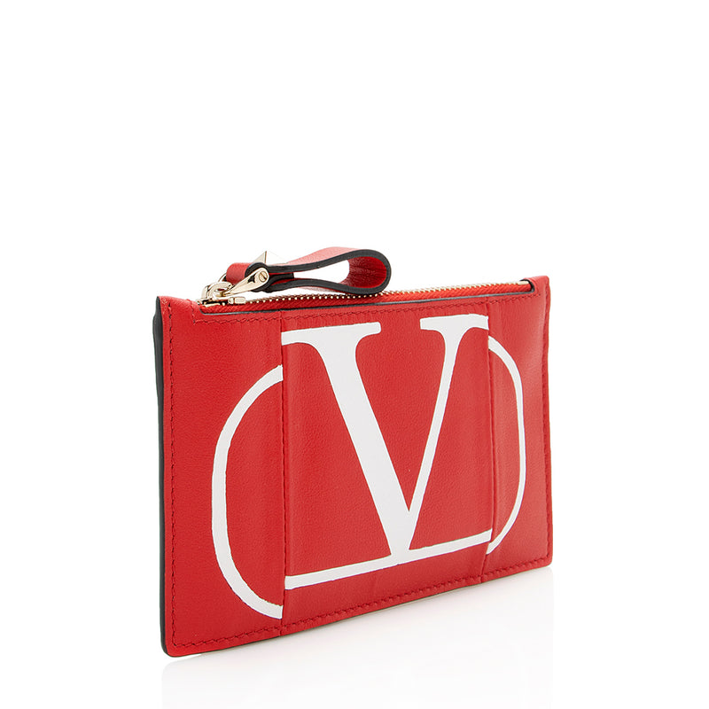 VLogo leather-trimmed clutch in neutrals - Valentino Garavani | Mytheresa